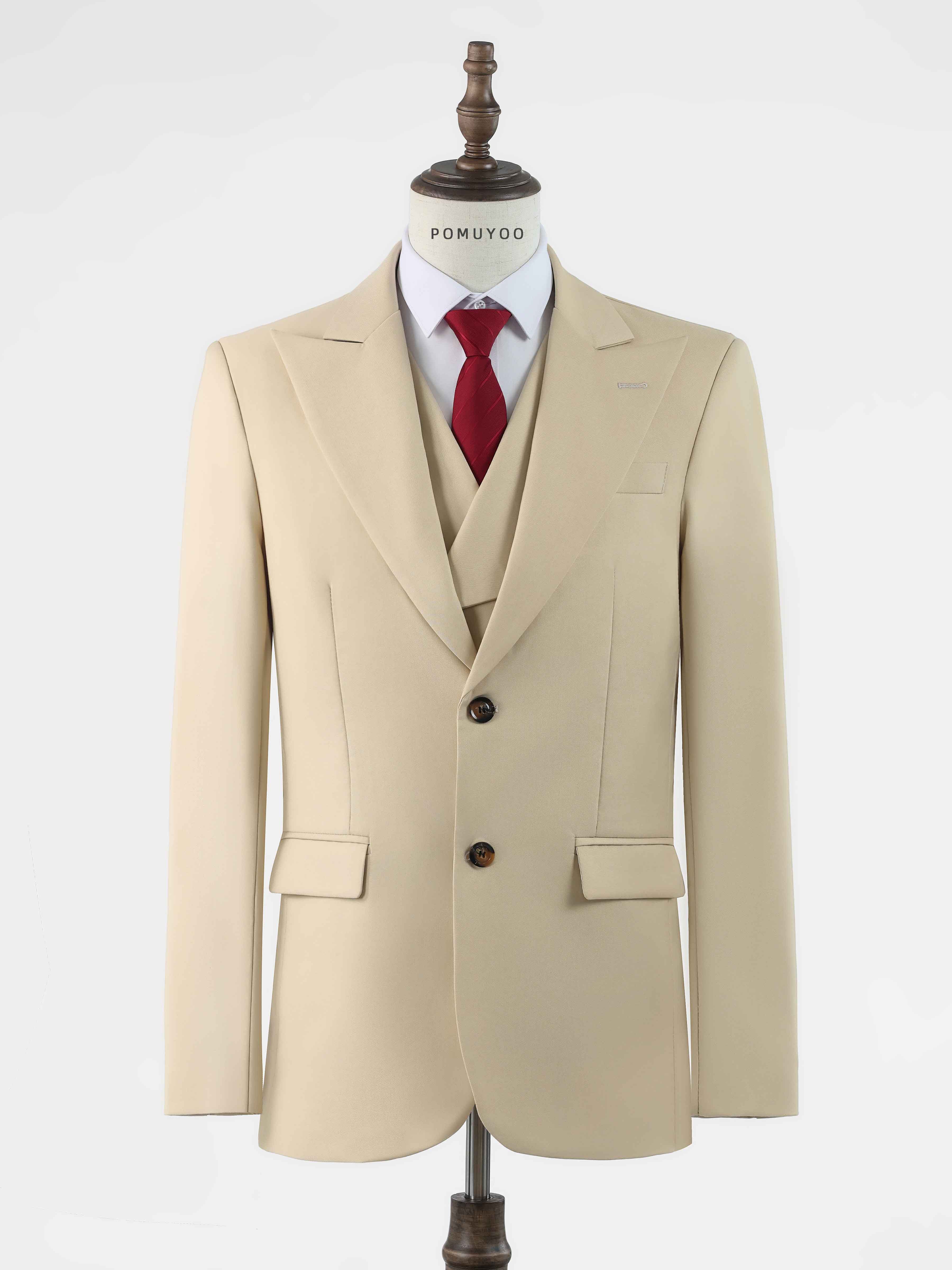 Front detail of beige men’s 3-piece suit with blazer, vest, and red tie